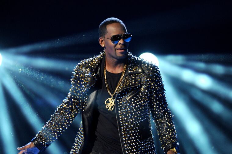 FILE - In this June 30, 2013, file photo, R. Kelly performs at the BET Awards in Los Angeles. Prosecutors will have to clear a series of high legal hurdles if they intend to charge R. Kelly anew and convict him, even if video evidence is available. Speculation the R&B star could face new charges arose after attorney Michael Avenatti said Thursday, Feb. 14, 2019, he recently gave prosecutors a VHS tape showing Kelly having sex with an underage girl. (Photo by Frank Micelotta / Invision / AP, File)