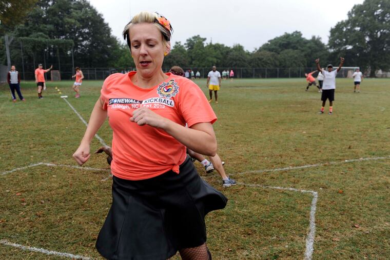 Holly Owens of team Snatching Fire crosses home plate during a Stonewall Kickball game in Raleigh, N.C. on Oct. 12, 2014. Stonewall Kickball is an all-inclusive league, which tries to create a non-intimidating environment that is fun for all participants. The league, in its second year, now boasts about 495 members. (Liz Condo/Raleigh News & Observer/MCT)