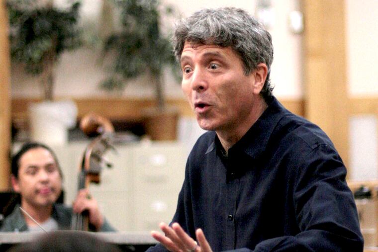 In this Sept 12, 2013 photo, provided by Me2/Orchestra, Ronald Braunstein conducts a rehearsal of the orchestra in South Burlington, Vt. Bipolar disorder slowed what might have been an explosive career for Braunstein. With his wife, French horn player Caroline Whiddon, Braunstein now runs the Me2/Orchestra, billed as ìthe worldís only classical music organization for individuals with mental illness and the people who support them.î (AP Photo/Me2/Orchestra, John Siddle)