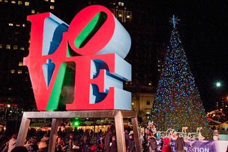 Philadelphia's Christmas tree shines brightly in LOVE Park. (Clem Murray / Staff Photographer)