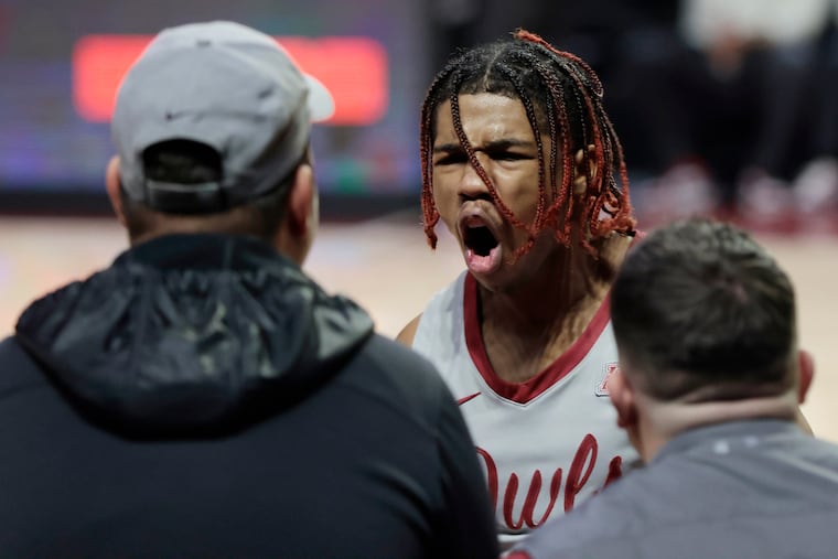 Temple guard Khalif Battle screams with courtside fans after he scored to put Temple ahead, 61-58. However, his 21 points weren't enough as the Owls dropped its first conference game of the season to Tulane.