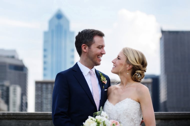 James Morse and Lauren Milleron the roof of the Free Library of Philadelphia.