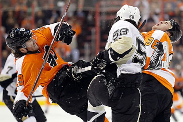 After a game full of roughhousing, Scott Hartnell scored the winning goal at the very end of overtime. (Yong Kim/Staff Photographer)