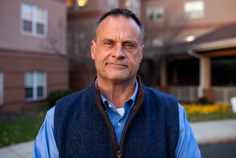 John Dubyk, president and CEO of Philadelphia Protestant home in the Northeast, stands outside the senior facility. The nursing home had an outbreak of COVID-19 among vaccinated nursing home residents in October and early November. Dubyk is relieved that residents have had booster shots now. There have been no new COVID-19 cases since Nov. 7.