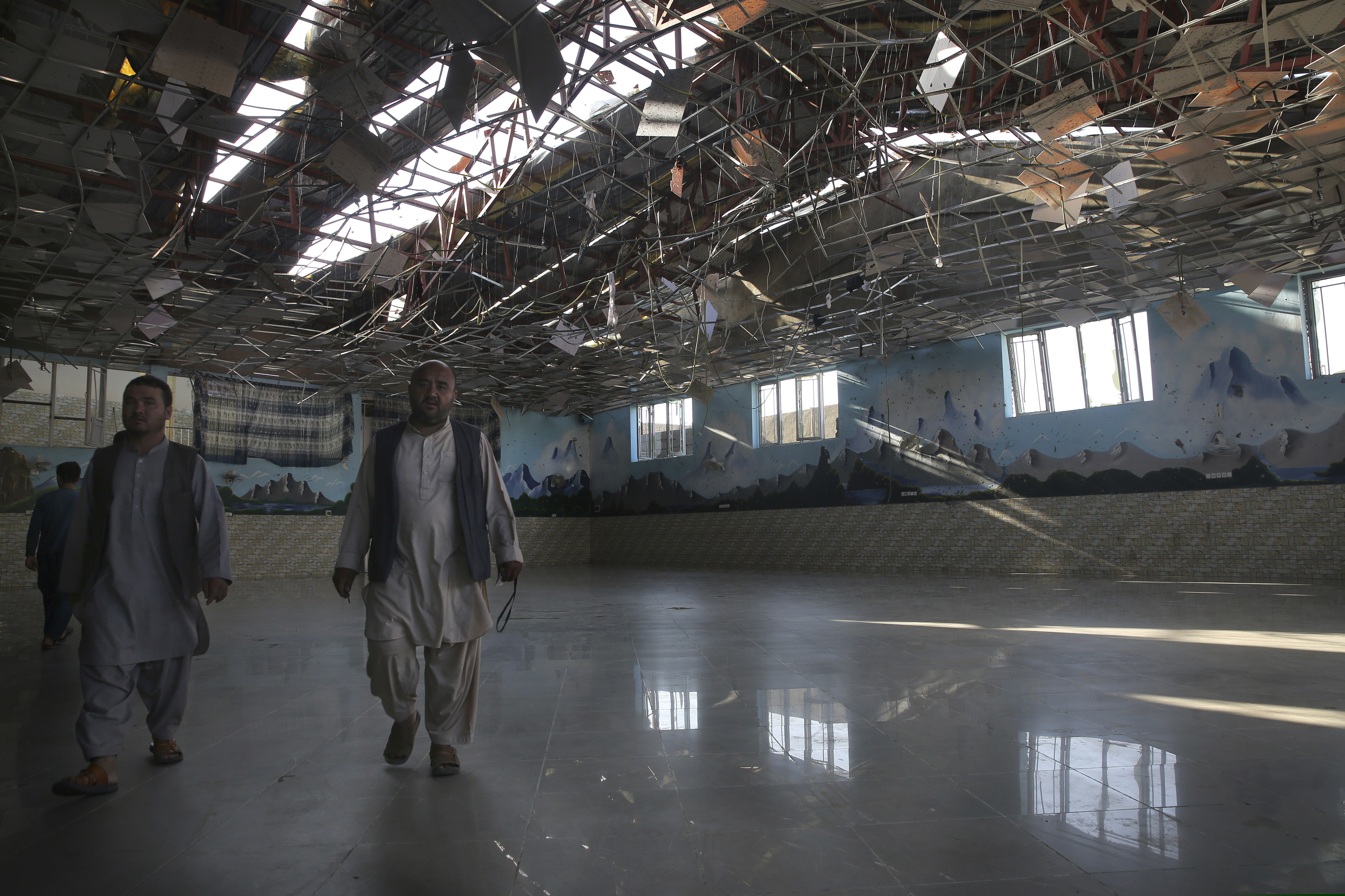 The damage of Dubai City wedding hall is seen after an explosion in Kabul, Afghanistan, Sunday, Aug.18, 2019. A suicide-bomb blast ripped through a wedding party on a busy Saturday night. (AP Photo/Rafiq Maqbool)