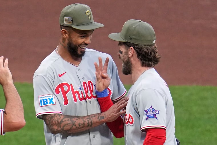 Phillies pitcher Cristopher Sanchez, left, and Bryce Harper were prolific in their team's 6-0 win in Pittsburgh.
