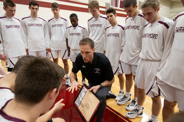 Swarthmore coach Landry Kosmalski huddled his team during a game against Ursinus in January.