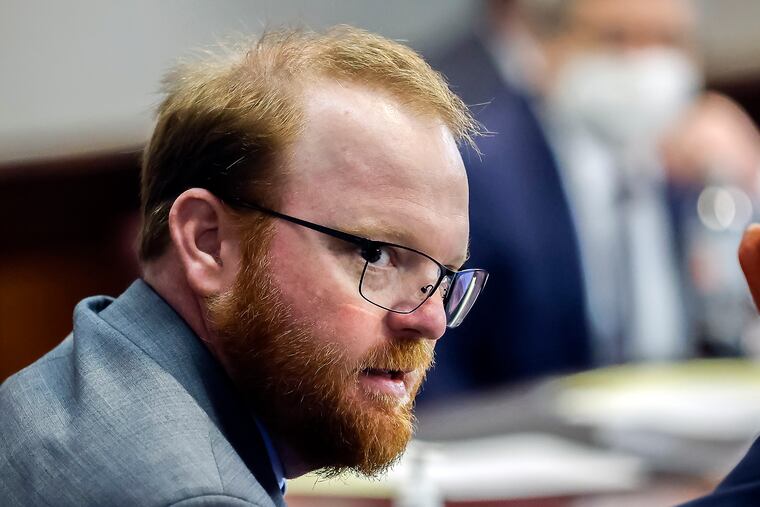 Travis McMichael, shown during the sentencing in his trial along with his father, Greg McMichael, and neighbor William "Roddie" Bryan in the Glynn County Courthouse, on Jan. 7.