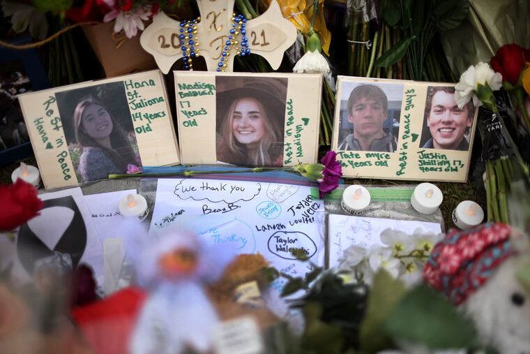 A memorial outside of Oxford High School on Dec. 3, 2021, in Oxford, Mich. Four students were killed and seven others injured in a shooting Nov. 30, 2021.