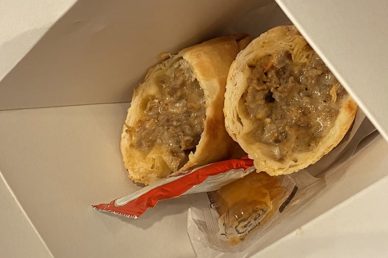 Philly Twist egg roll in a Chinese takeout box at Better Box.