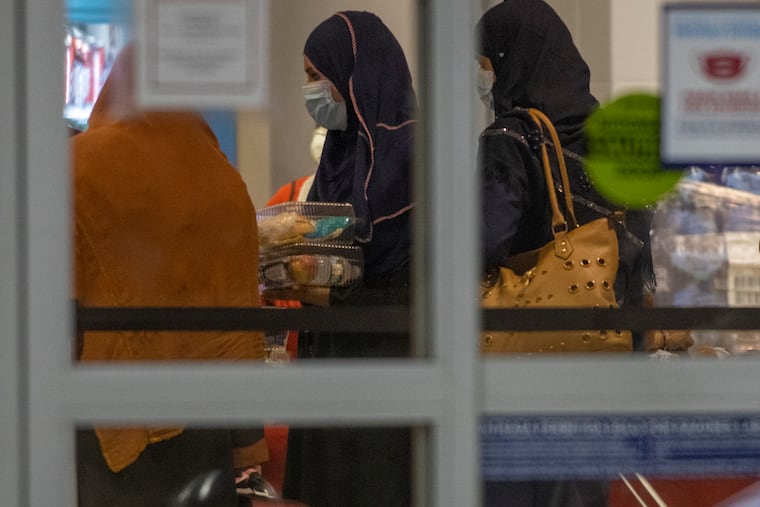 The first of the Afghans arrive at Philadelphia International Airport on Saturday morning.