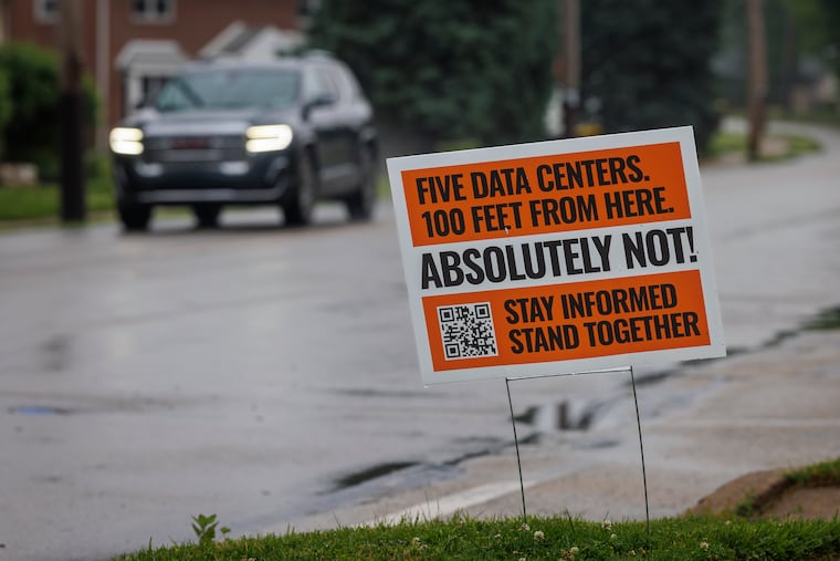 A lawn sign is pictured Wednesday along Crooked Lane in King of Prussia, where some residents oppose the 4.6 million square feet of data centers planned nearby.