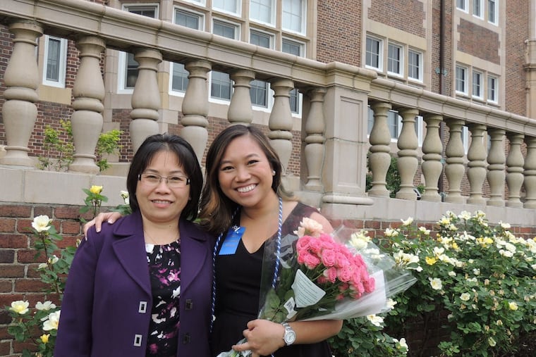 Tuyet Le stands with her daughter, Kimberly Ho.