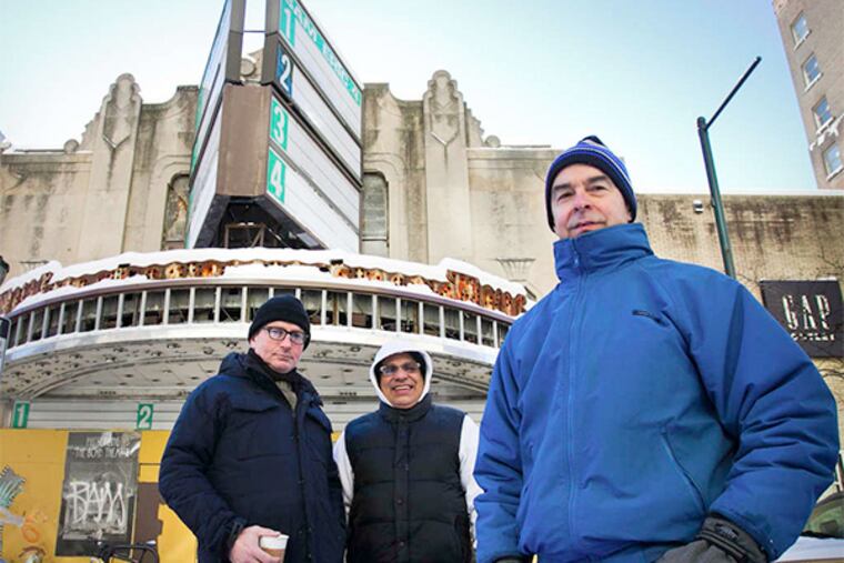 Henry Hauptfuhrer (front), a Friends of the Boyd activist, is joined by Robert Blackiston (left) and Victor Ortiz, who all hope to keep the theater standing - inside and out.