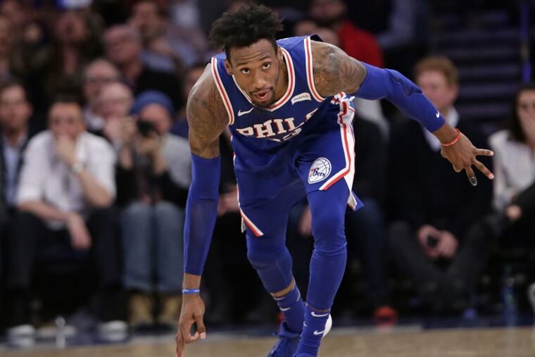Sixers’ forward Robert Covington celebrates after making a three-pointer against the Knicks on Thursday.