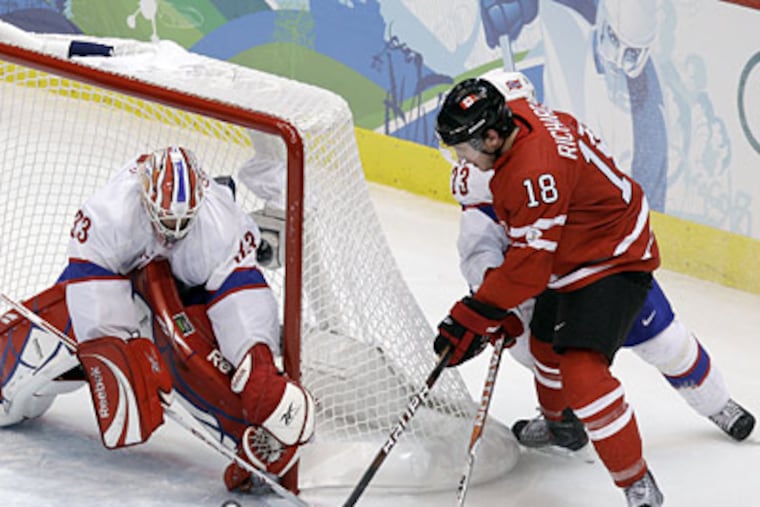 Mike Richards scores a goal in Canada's win over Norway at the Vancouver 2010 Olympics on Tuesday. (AP Photo/Julie Jacobson)