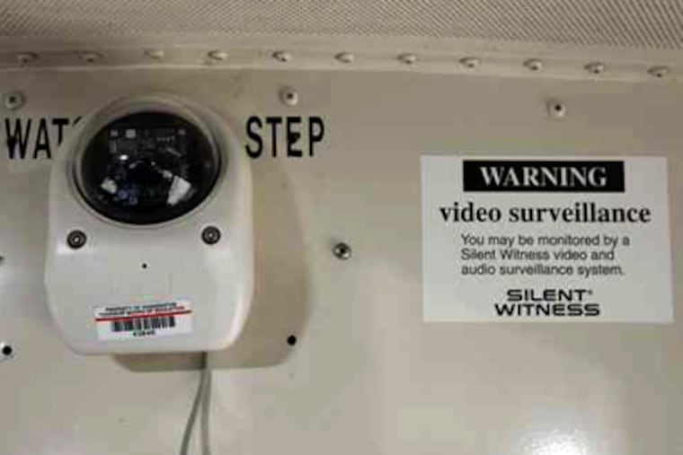 In Washington Township, a camera installed on each school bus monitors the activity of students. In 2004, voters approved a tax increase to bolster school security. (Laurence Kesterson / Staff Photographer)