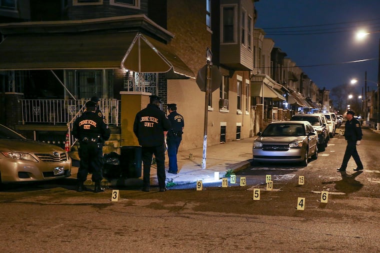 The Philadelphia Police Crime Scene unit work the 2300 Block of W. Harold Street were 5 people were shot with more than 20 rounds fired during a late gathering Monday night. Tuesday, March 31, 2020.