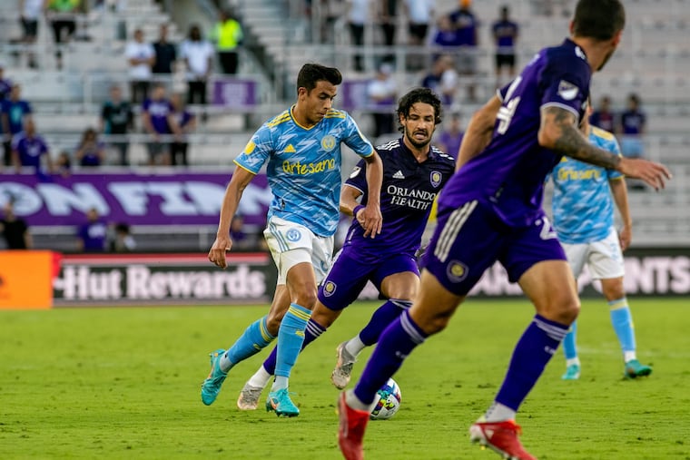 Quinn Sullivan (left) on the ball during the first half of Tuesday's game.