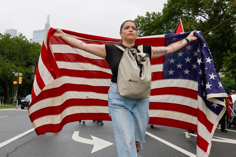 Whitney Bennett marches in the “No Kings” protest Saturday, June 14, 2025, in Philadelphia.