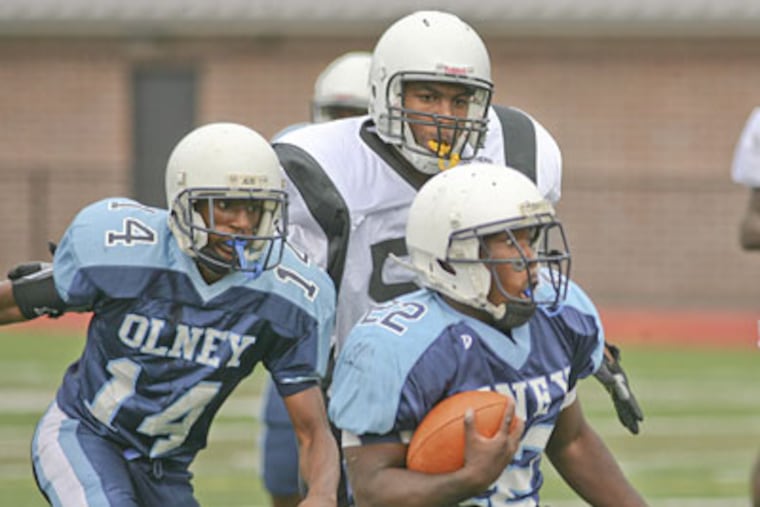 Tyree Parks, (above, top center), played for South Philadelphia High and coached in a youth basketball league. He was gunned down in a drive-by shooting. (Yong Kim / Staff Photographer)