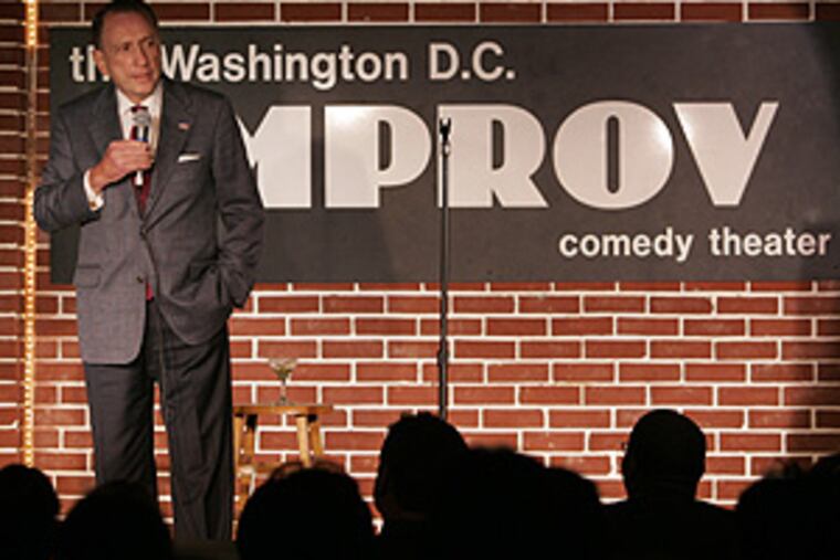 Sen. Specter delivers a comedy routine at the DC. Improv
as part of a benefit program in Washington last night.