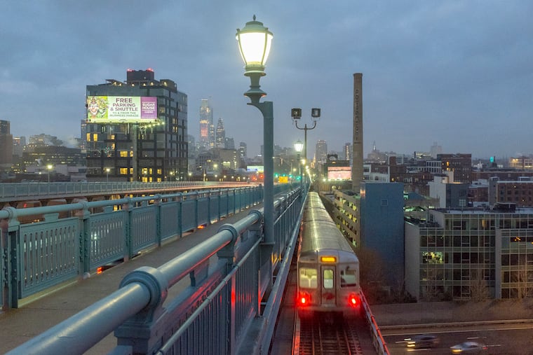A PATCO train heads into Philadelphia over the Ben Franklin Bridge, Friday morning December 14, 2018.