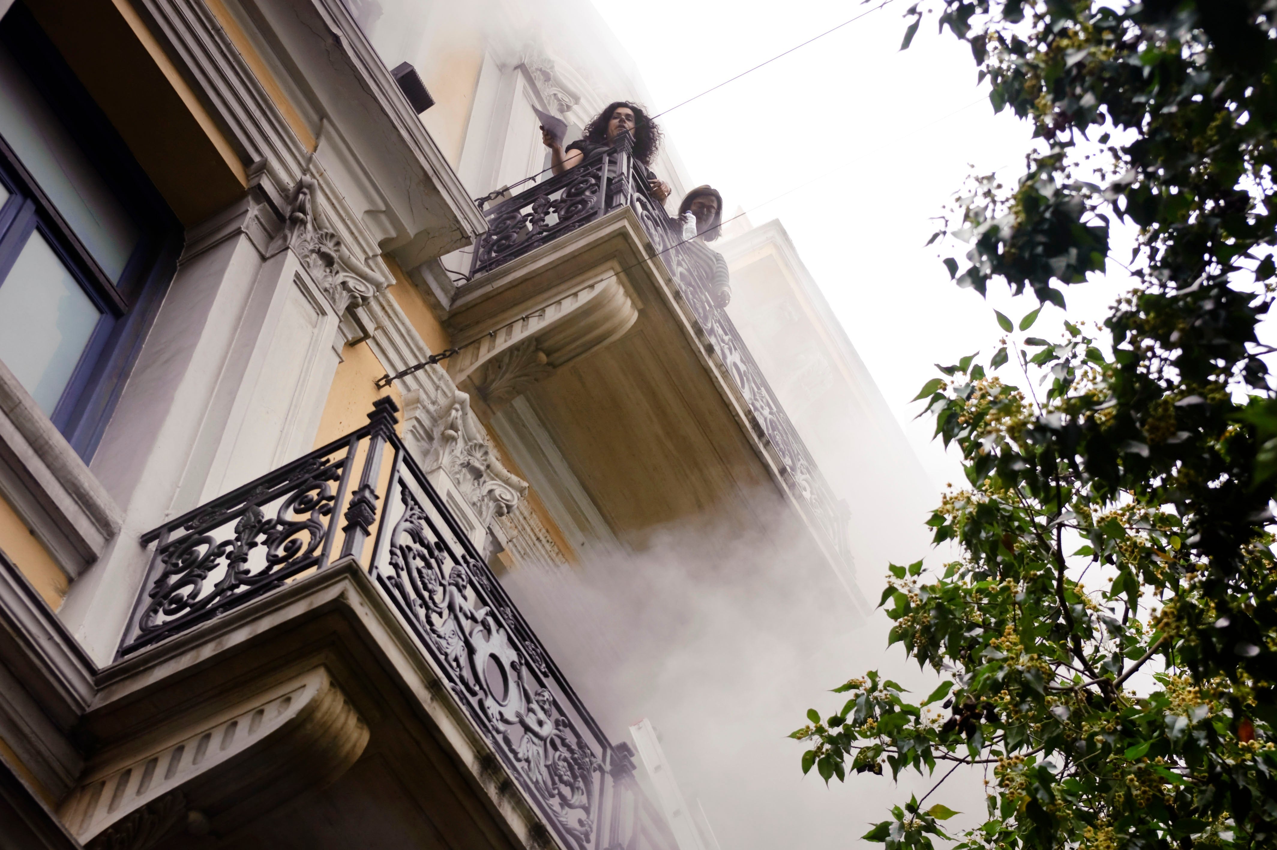 Greek police arrest 2 people over 2010 fatal arson attack on Athens bank