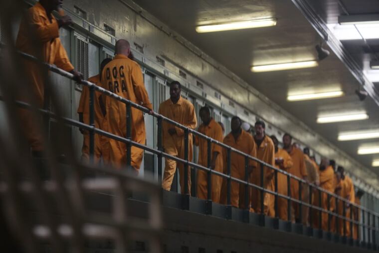 Inmates return to their cells at SCI Graterford Thursday September 7, 2017.