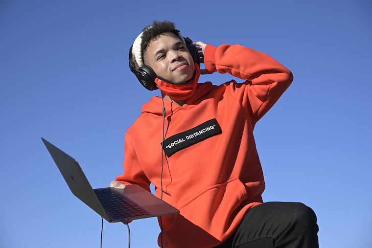 Amorphous, Jimir Reece Davis, listens to music at a city park near his home, Friday, Jan. 29, 2021, in Orlando, Fla. (Phelan M. Ebenhack for the Philadelphia Inquirer)