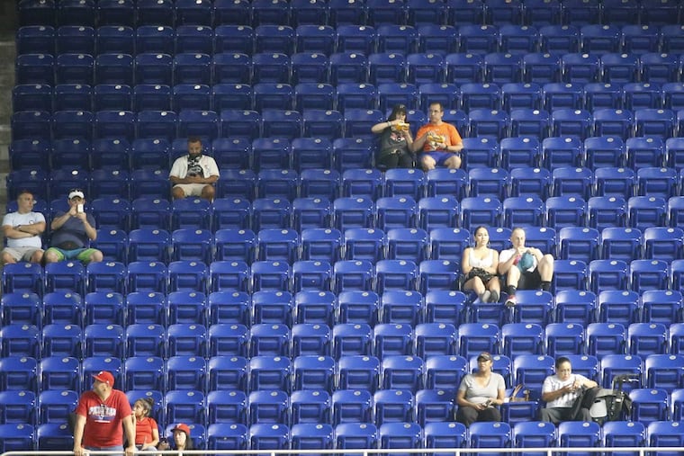 There were plenty of empty seats in the stands at Marlins Park in Miami Monday night during the first inning of a game between the Phillies and the Marlins.