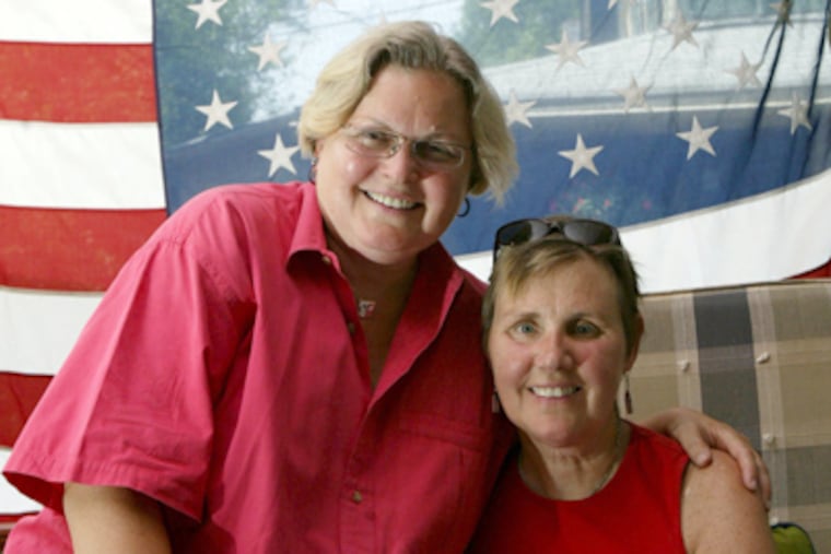 Diane Marini (left) and Marilyn Maneely at their Haddonfield home in 2005, the year of Maneely’s death from ALS. (Mel Evans / Associated Press)
