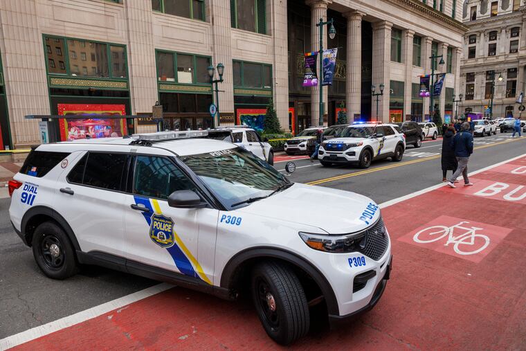 Police block traffic along Market Street between 13th and City Hall during homicide investigation at Macy’s. Philadelphia police investigate a fatal stabbing at the Macy’s at 13th and Market Street in Philadelphia on Monday, December 4, 2023.