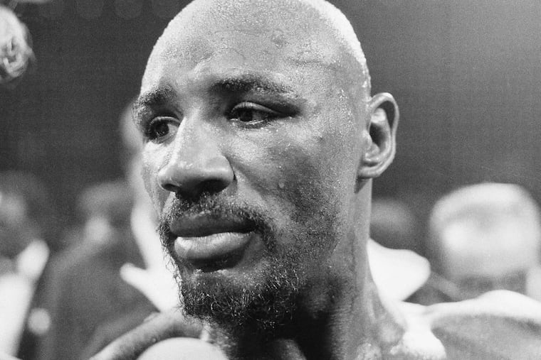 FILE In this August 1974 file photo, Marvin Hagler stands in the ring after his boxing bout against Sugar Ray Seales in Boston. Hagler, the middleweight boxing great whose title reign and career ended with a split-decision loss to “Sugar” Ray Leonard in 1987, died Saturday, March 13, 2021. He was 66.