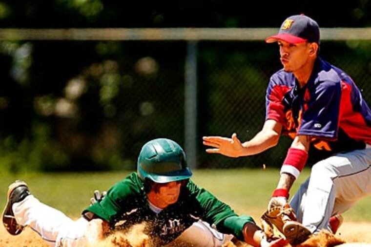 Bonner's Jamie Juisti gets back to second on an attempted pick-off play as Frankford's Israel Diaz covers. (Ron Cortes/Staff Photographer)