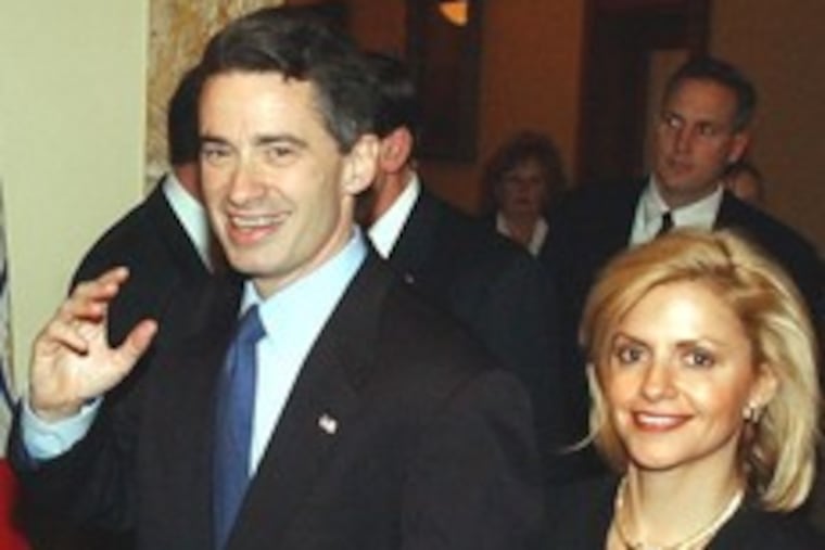 Jim McGreevey and wife Dina Matos McGreevey in early 2004. Caught in the middle of their dispute is daughter Jacqueline.