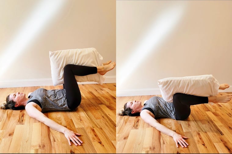 Ashley demonstrates a spinal twist.