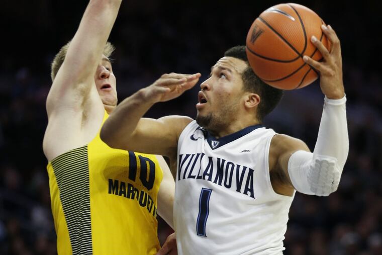 Villanova guard Jalen Brunson (1) goes to the basket as Marquette guard Sam Hauser (10) defends.