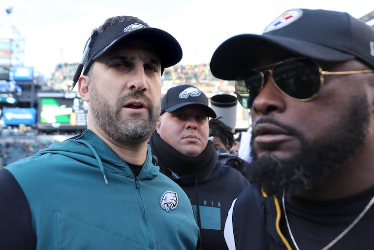Eagles coach Nick Sirianni (left) and Steelers coach Mike Tomlin meet on the field after the Birds won, 35-13, on Oct. 30, 2022. Tomlin's Steelers started 11-0 in 2020 and things went quickly downhill from there.