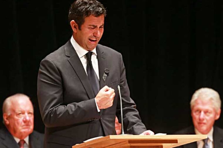 Lewis Katz's son Drew A. Katz becomes emotional speaking last at the memorial service at Temple University Wednesday June 4, 2014. ( DAVID SWANSON / Staff Photographer )