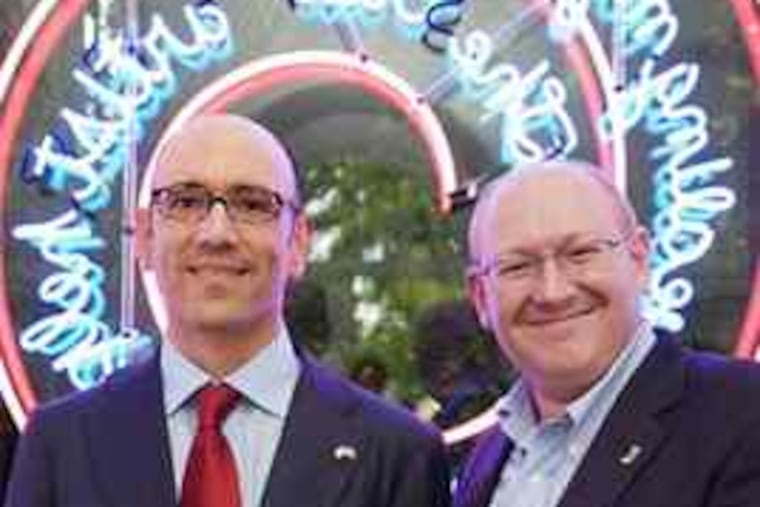 Philadelphia Museum of Art curators Carlos Basualdo (left), of contemporary art, and Michael R. Taylor, of modern art, hold the top Biennale honor. The Bruce Nauman triumph stakes a claim for the museum in contemporary art.