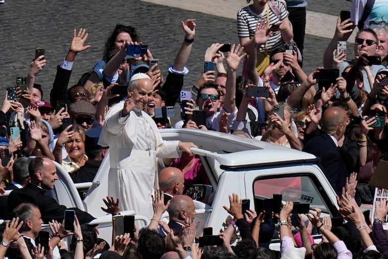 Pope Leo XIV greets the faithful at the end of Easter Mass he presided over in St. Peter's Square at the Vatican, Sunday, April 5, 2026.
