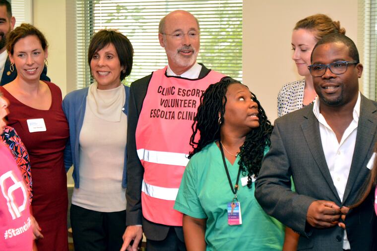 Planned Parenthood is planning to spend $1.5 million to help reelect Gov. Wolf. Here, the Democratic governor is seen visiting a Planned Parenthood facility in Philadelphia last year.