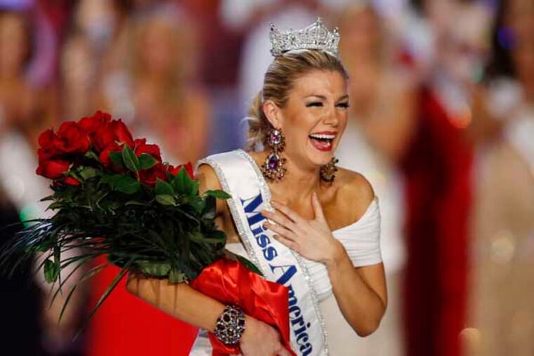 FILE - In this Jan. 12, 2013 file photo, Miss New York Mallory Hytes Hagan reacts as she is crowned Miss America 2013 in Las Vegas. Gov. Chris Christie's spokesman Michael Drewniak on Wednesday night, Feb. 13, 2013 confirmed news of the Miss America pageant's return to Atlantic City. Lt. Gov. Kim Guadagno is scheduled make a formal announcement Thursday on Atlantic City's Boardwalk Hall. (AP Photo/Isaac Brekken, File)