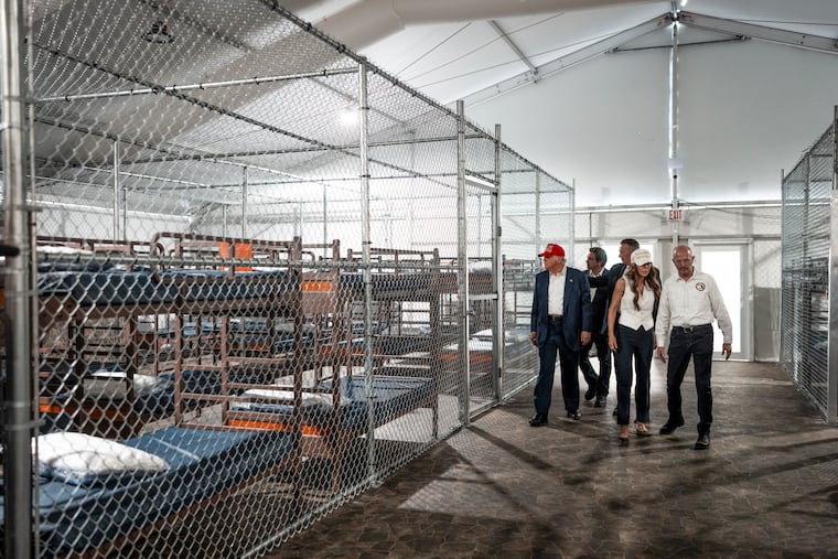 President Donald Trump and Kristi Noem, then his Homeland Security secretary, tour the detention camp billed by the state of Florida as Alligator Alcatraz, at the Dade-Collier Training and Transition Airport in Ochopee, Fla., July 1, 2025. Florida is now shutting down the high-profile immigration detention center, which DHS officials have concluded is too expensive to operate.