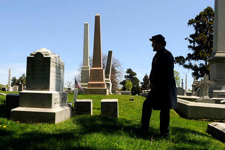Andy Waskie, a historian and Temple professor, stands at the grave of Samuel W. Crawford at Laurel Hill Cemetery in East Falls. Crawford was a Union general and surgeon who served at Gettysburg and Antietam.