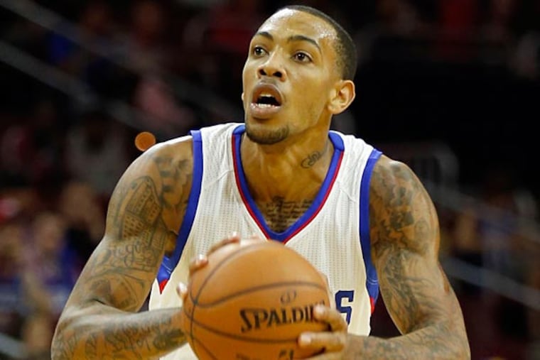 Malcolm Thomas shoots the basketball against the Orlando Magic. (Yong Kim/Staff Photographer)