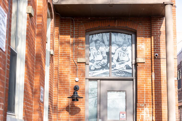 “Institute for Colored Youth Baseball Team,” a photo archive a part of Reflecting Revenants project recalling black life in the 7th ward, seen at the Randall School Condominiums at 915 Bainbridge Street in Philadelphia, Pa., a stop on the "Legacy Reclaimed: A 7th Ward Tribute" walking tour.