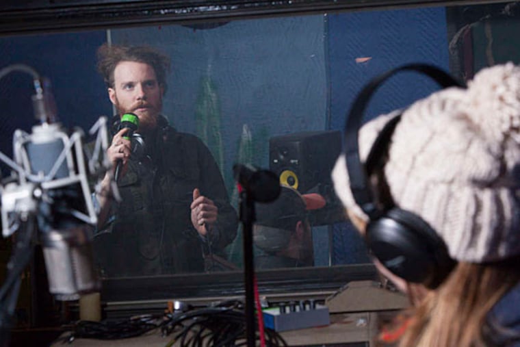 At Stolen Studios in Kensington, sound engineer Scott Stitzer discusses a take with vocalist Abi Reimold. Many engineers at the DIY studios are also musicians. (Alex Udowenko)