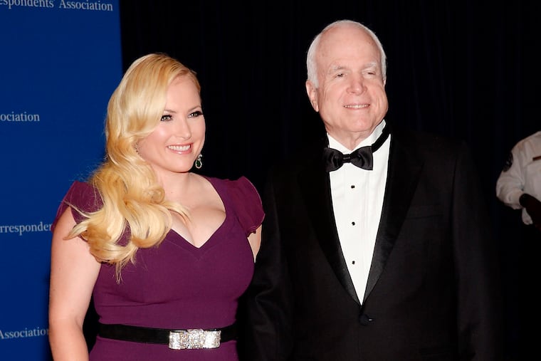 FILE - In this May 3, 2014 file photo, Meghan McCain, and Sen. John McCain attend the White House Correspondents' Association Dinner in Washington. Meghan McCain says President Donald Trump's life is “pathetic” after his Twitter attack against her father, the late Sen. McCain. She fired back Monday, March 18, 2019, at Trump on “The View” after the president tweeted comments over the weekend criticizing her father, who died last year after battling brain cancer. (Photo by Evan Agostini/Invision/AP, File)